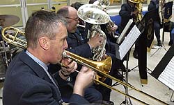 Wg Cdr Trevor Kirkin-Chairman of the RAF Voluntary Band Association seen playing the trombone.