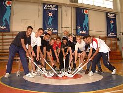 Members of the Leeds Muslim Community play Deck hockey with student pilots from 207 Sqn on a recent visit to Linton.